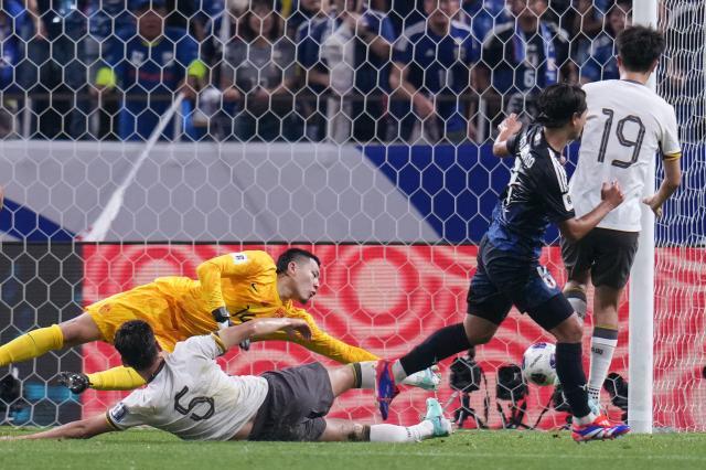 1725542561286013806.jpg (体育)(14)足球——世预赛:中国队对阵日本队XxjpseC007437_20240905_PEPFN0A001.jpg